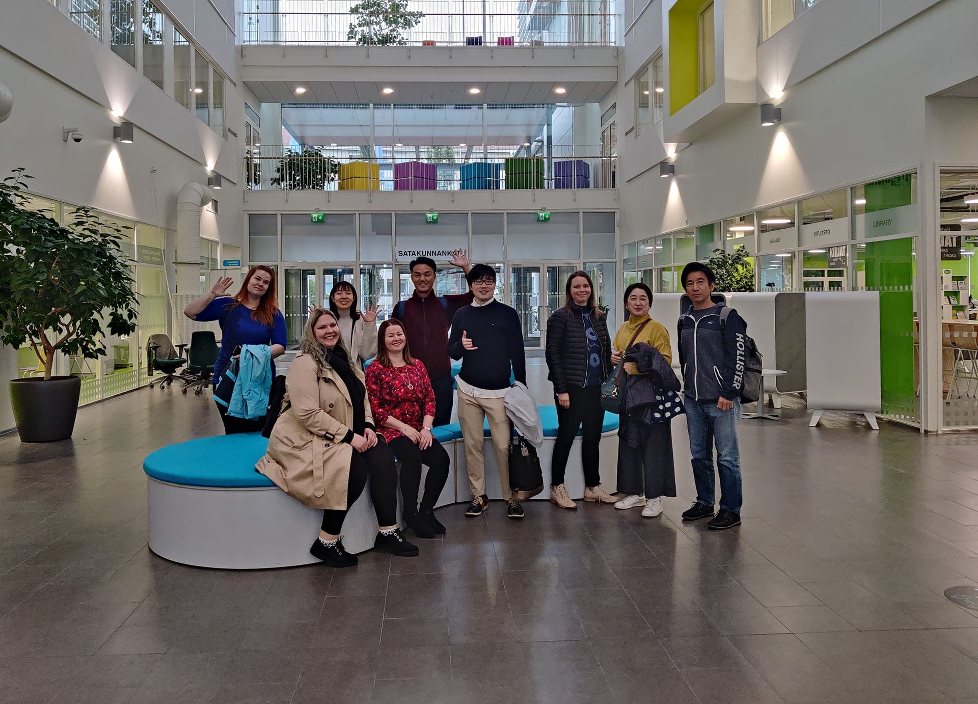 Japanese group posing at the main lobby at SAMK campus Pori.