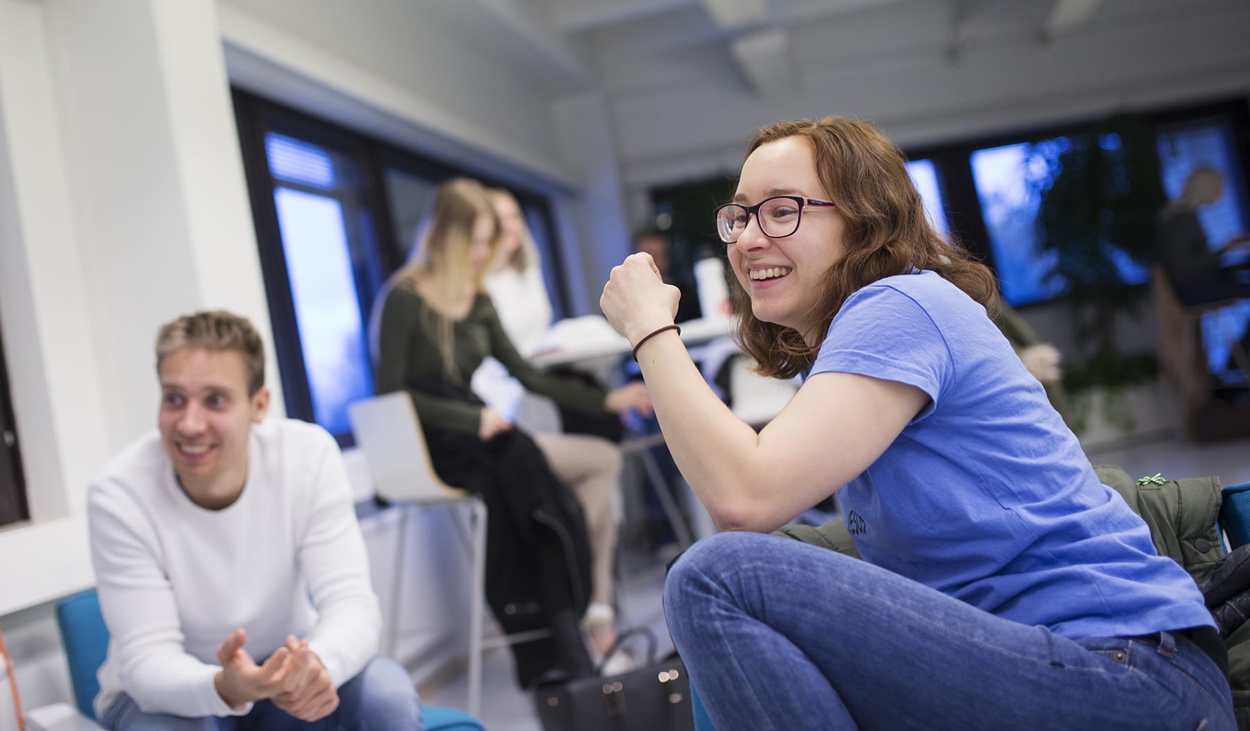 Students sitting in group workspace at Rauma campus.