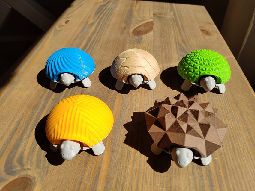 Colourful 3D printed turtles.