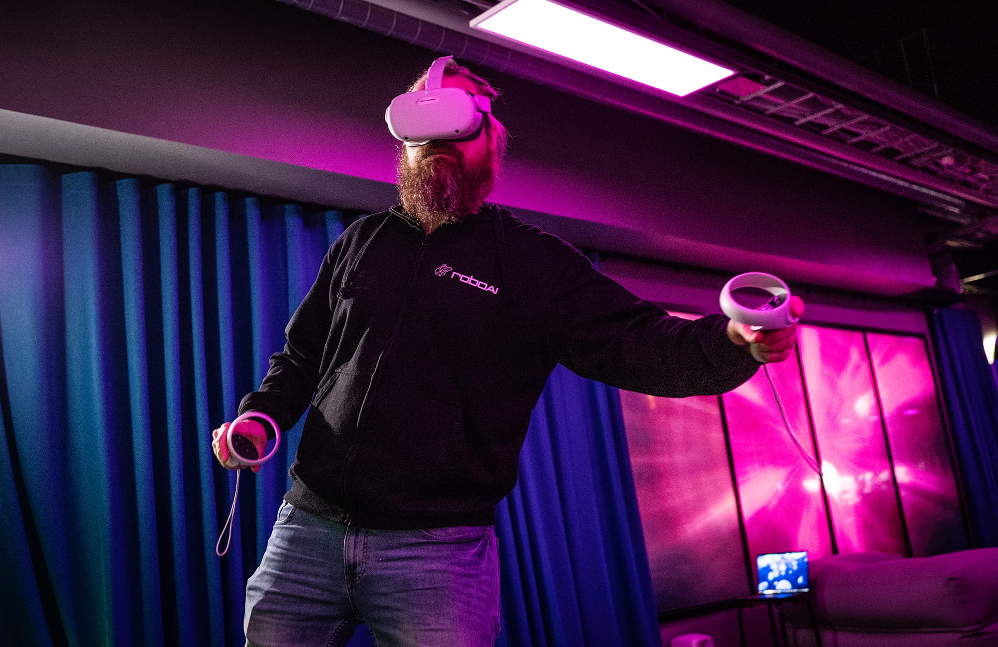 A man playing a game with VR glasses.