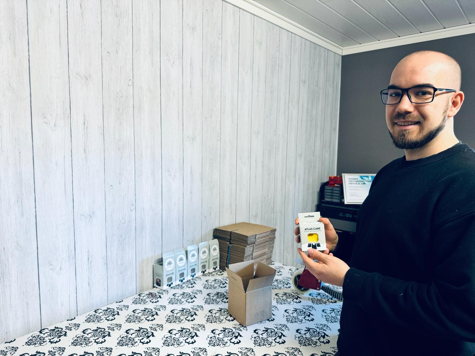 Joonas Rakkolainen shows off the product he has developed, Atlas Care.